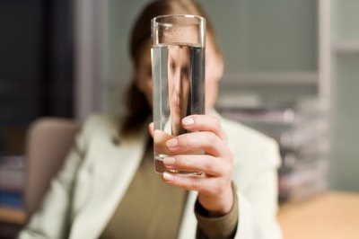 Creatas Images/Creatas/Getty Images Ask your supervisor to explain the company rules about drinking water during work hours.