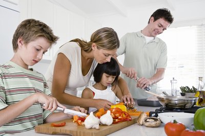 Jupiterimages/Pixland/Getty Images Living cheaply doesn’t have to mean living poorly.