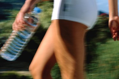 Goodshoot/Goodshoot/Getty Images Getting up and moving can help increase glute development.