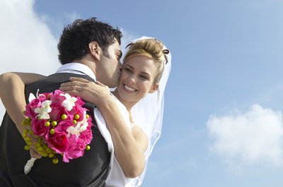 Digital Vision./Digital Vision/Getty Images Review your finances before you say "I do."