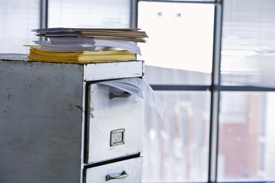 Jupiterimages/BananaStock/Getty Images If any paperwork is missing, your closing will get delayed.