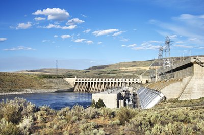 Jupiterimages/Comstock/Getty Images Investing in utility securities supports the country's infrastructure.