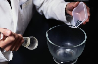 Keith Brofsky/Photodisc/Getty Images Pharmacy techs might compound, or mix, some medications such as ointments.