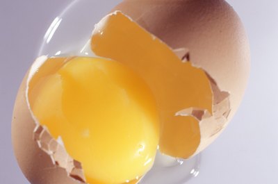 Photodisc/Photodisc/Getty Images Egg yolks contain all the egg's fat and most of its nutrients.