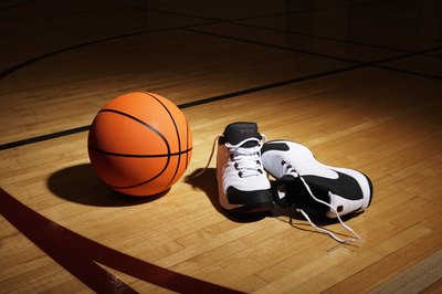 Thomas Northcut/Photodisc/Getty Images High tops may not protect your ankles any more than other types of shoes.