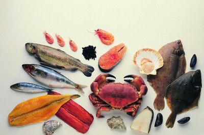 Stockbyte/Stockbyte/Getty Images Eating seafood regularly can improve your cognitive function.