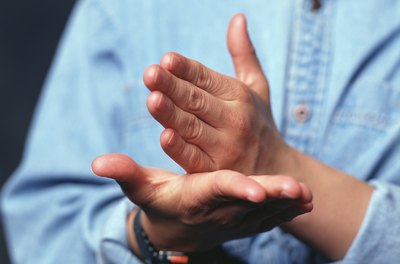 Stockbyte/Stockbyte/Getty Images Many sign language interpreters are self-employed and can therefore set their own work schedules.