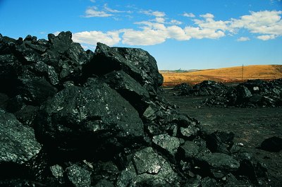 Photodisc/Photodisc/Getty Images You may wish to buy shares of a company that mines minerals, such as coal.
