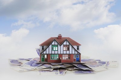 Andrew Bret Wallis/Photodisc/Getty Images Paying your mortgage early saves thousands of dollars in interest.