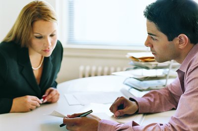 Digital Vision./Digital Vision/Getty Images The details of a job offer might make it a poor fit for you.