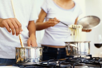 George Doyle/Stockbyte/Getty Images Renting an apartment together can work with a little planning.