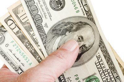 Robert Kirk/Photodisc/Getty Images Watch your savings stack up.