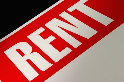 Medioimages/Photodisc/Photodisc/Getty Images Lease extensions give you a chance to lock in a favorable rental rate.