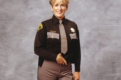 David Hiller/Photodisc/Getty Images Potential sheriffs might face questions about resolving interpersonal conflicts.