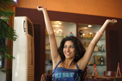 Visage/Stockbyte/Getty Images Getting your green card is an accomplishment worth celebrating.
