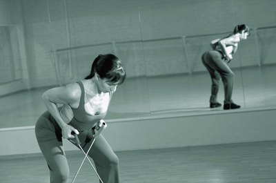 Medioimages/Photodisc/Valueline/Getty Images Elastic resistance training increases the effectiveness of your workouts.