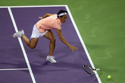 Bryn Lennon/Getty Images Sport/Getty Images If you drop or throw your racket to hit the ball, you'll lose the point.