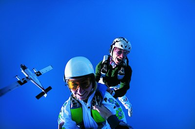 Digital Vision./Digital Vision/Getty Images Skydiving is an adventurous job in which you can get paid to enjoy.