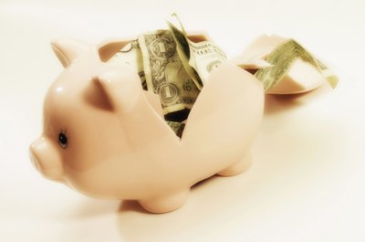 Medioimages/Photodisc/Photodisc/Getty Images Borrowing from your 401(k) is easier than most loans, but the cost may be high.