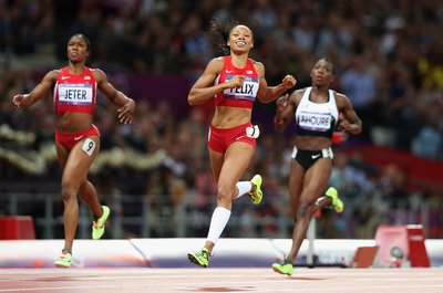 Ezra Shaw/Getty Images Sport/Getty Images Allyson Felix crosses the finish line first for Olympic gold in the 200 meters.