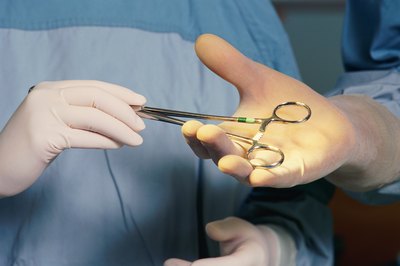 Stockbyte/Stockbyte/Getty Images Either surgical technologists or perioperative nurses can assist at surgical procedures.