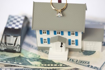 Creatas/Creatas/Getty Images Protect your property before you say "I do."