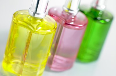 BananaStock/BananaStock/Getty Images Perfume is only one of many possible sources of odors in the workplace.