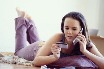 Goodshoot/Goodshoot/Getty Images Cardholders can request credit line increases if they don't come automatically.