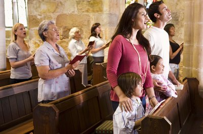 Jupiterimages/Polka Dot/Getty Images A praise leader helps plan meaningful worship through music.