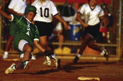 Ablestock.com/AbleStock.com/Getty Images Softball burns calories at a low to moderate rate.