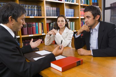 Pixland/Pixland/Getty Images Heirs may receive money or property after someone dies.