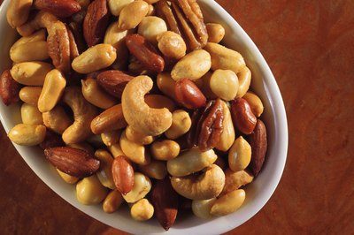 Comstock/Comstock/Getty Images Choose unsalted, mixed nuts to avoid eating too much sodium.
