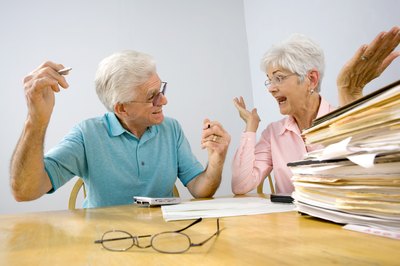 Photos.com/Photos.com/Getty Images Retired spouses have two different ways to earn Social Security retirement.