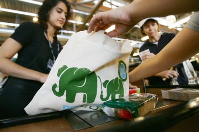 David McNew/Getty Images News/Getty Images Invest in canvas tote bags to limit the number of plastic shopping bags you collect.
