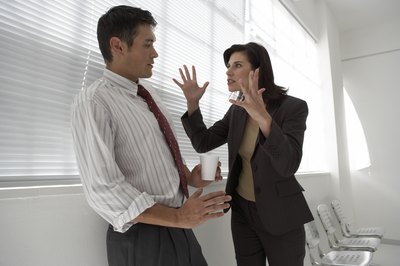 Pixland/Pixland/Getty Images Management and employees should resolve conflict professionally and respectfully.