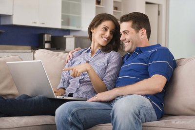 Jupiterimages/Comstock/Getty Images Use a household budget to plan for the future.