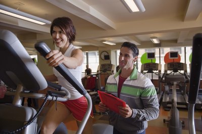 Jupiterimages/Comstock/Getty Images Cardio can help decrease body fat without building bulk muscle.