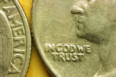 Photos.com/Photos.com/Getty Images Scratches on a rare coin can greatly reduce its value.