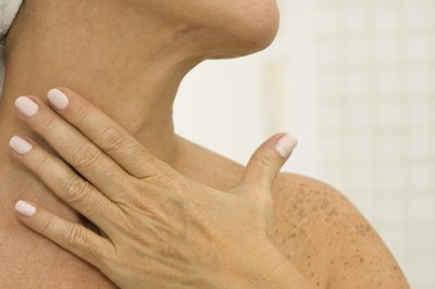 Medioimages/Photodisc/Photodisc/Getty Images Strengthen the front of your neck and lengthen the back.