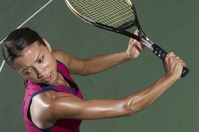 Wendy Hope/Stockbyte/Getty Images Strong arms can help you hit with power.