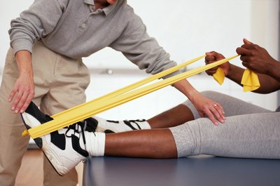 Keith Brofsky/Photodisc/Getty Images One big difference? No handles with resistance bands.