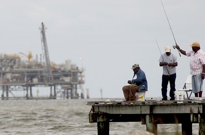 Mario Tama/Getty Images News/Getty Images Underwater welders perform maintenance and repairs on oil rigs and similar structures.