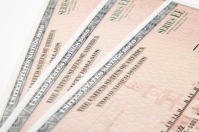 Creatas/Creatas/Getty Images Co-owners on savings bonds have equal rights to hold or redeem the bonds.