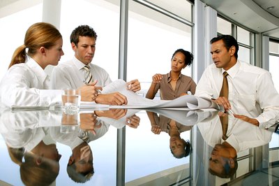 Goodshoot/Goodshoot/Getty Images Effective communication methods ensure work assignment success.