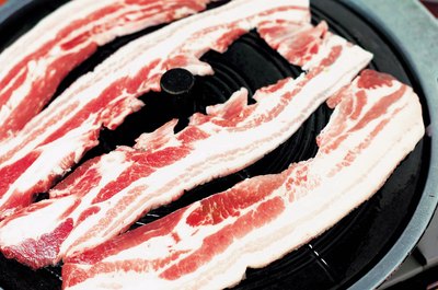 Jupiterimages/Photos.com/Getty Images Processed meats are particularly bad for you.