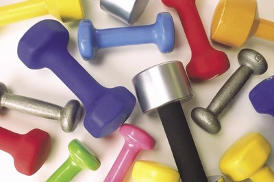 Ablestock.com/AbleStock.com/Getty Images Wrist weights are safer than dumbbells during cardio exercises.