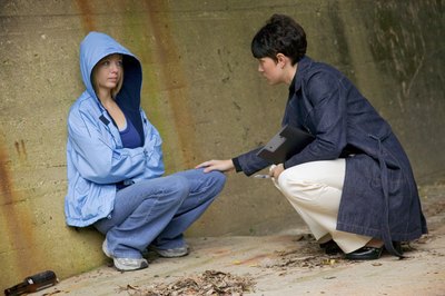 Jupiterimages/liquidlibrary/Getty Images Drug abuse interventionists earn higher salaries in the education industry.