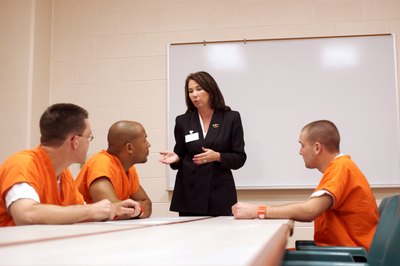 Thinkstock/Comstock/Getty Images Prison psychiatrists treat individuals and groups.