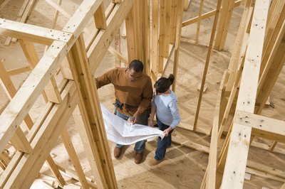 Comstock Images/Comstock/Getty Images A new home is constructed according to current codes and features that can save money.