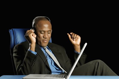 Medioimages/Photodisc/Photodisc/Getty Images Music supervisors capture emotion and create atmosphere in visual productions.